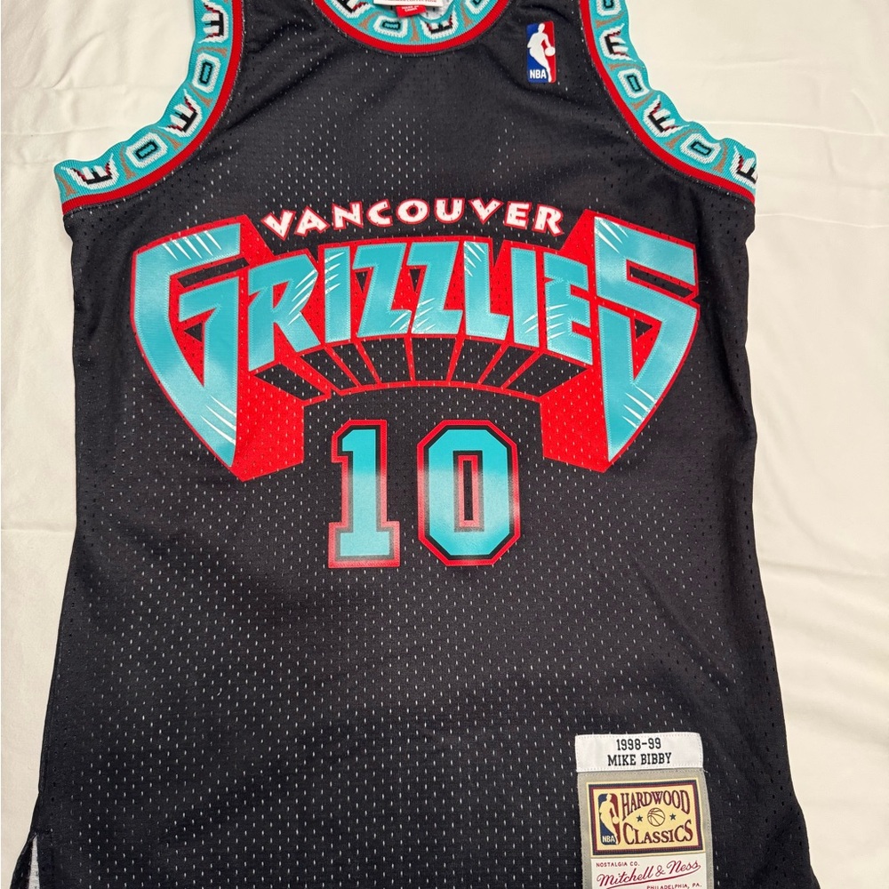 NBA Black Jersey with Teal and Red Accents